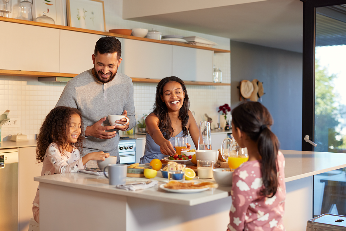 family enjoying breakfast together family enjoying breakfast together